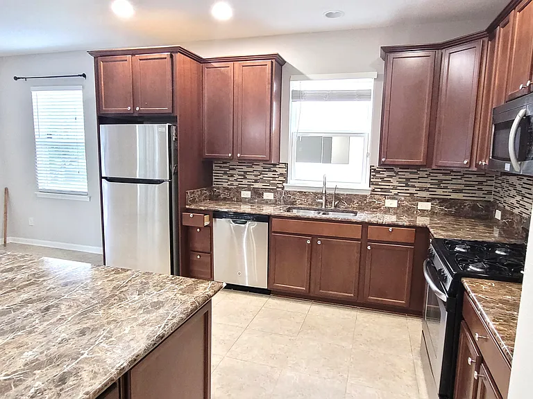House Fully and Freshly repainted with consistent neutral modern color.