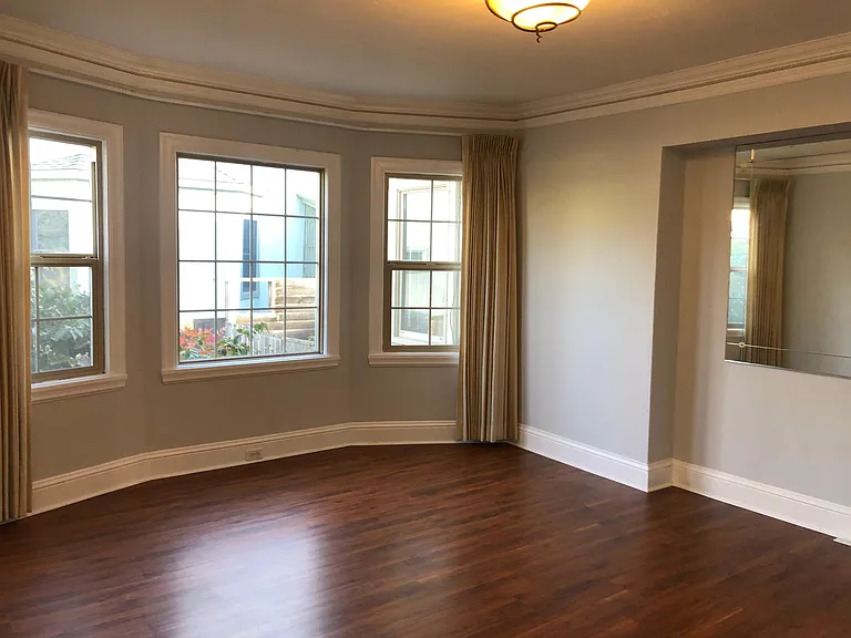 Dining Room with Bay windows. (Some residents have used the eat-in Kitchen for dining and the Dining Room as a spacious office or playroom)