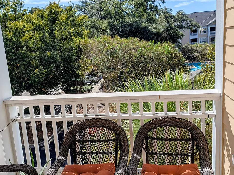 Patio w/ storage closet & views of community pool