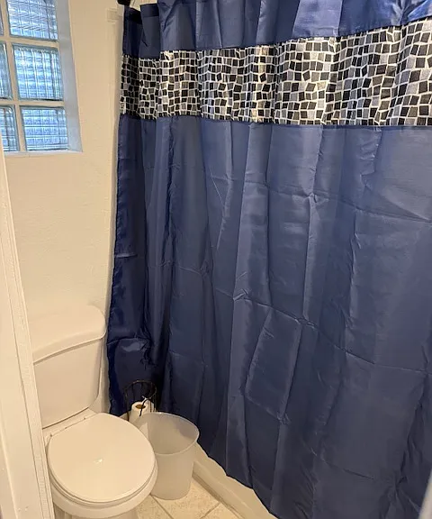 Shower curtain included!