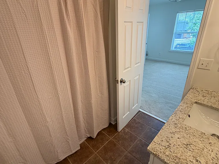 Additional view of full bathroom in bedroom #2.