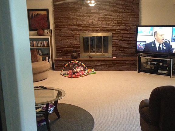 Looking into den from dining
