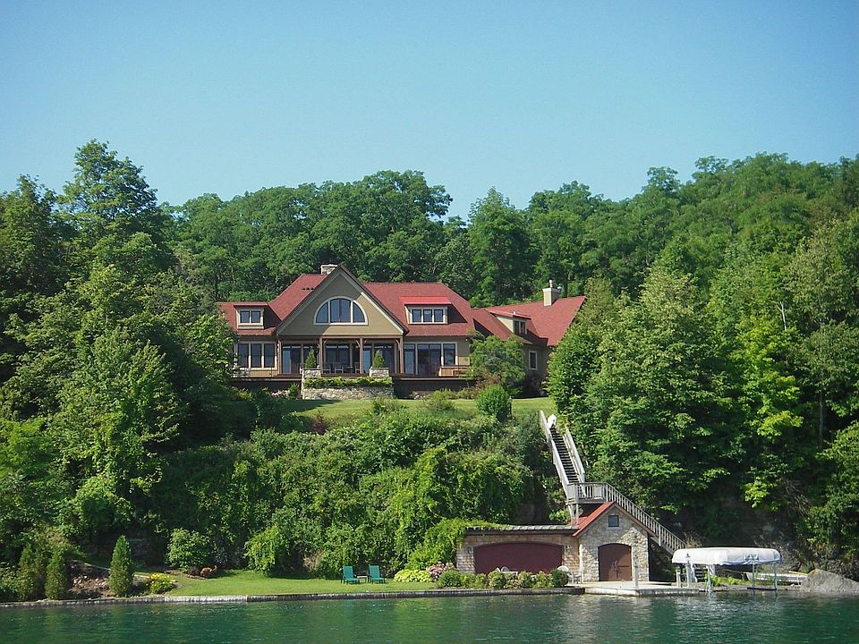 220 ft lakefront, 5+ acres