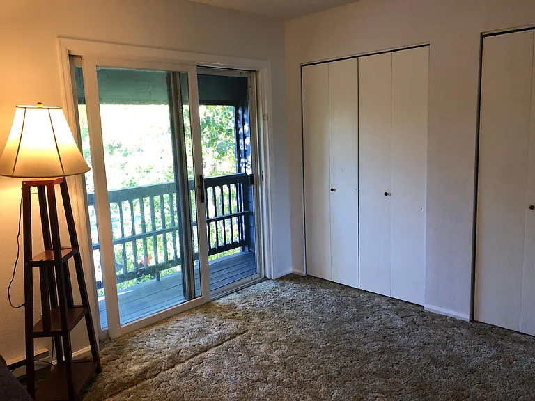 Upstairs North bedroom with balcony, two large closets