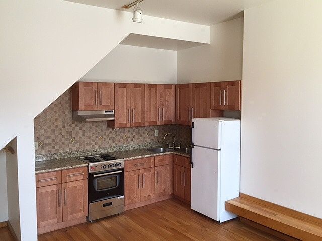 new kitchen with stainless steel range/oven