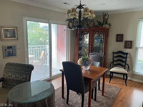 Formal dining has private balcony/patio with storage closet