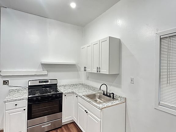 Recently upgraded kitchen cabinets, flooring and appliances