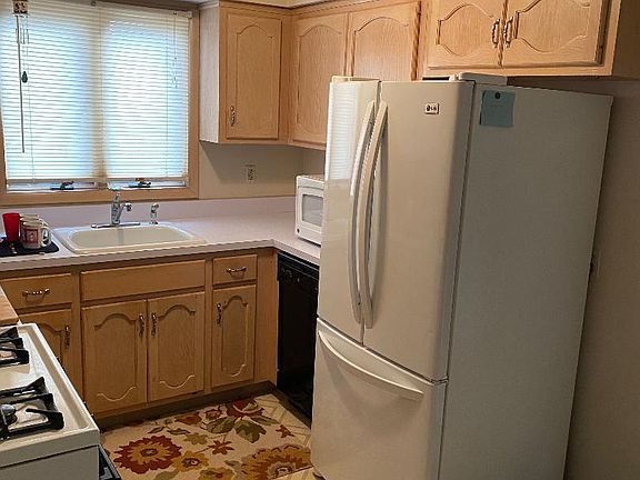 Kitchen with French Door Refrig, Dishwasher and Gas Stove