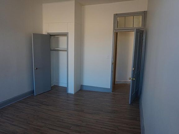 Hallway door to room, with closet.