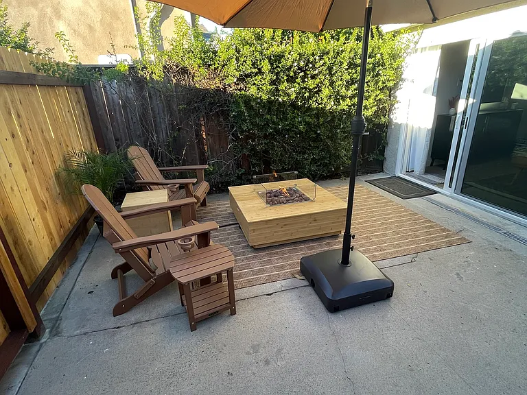 Get outside and enjoy a private place to get some fresh air and sun or shade with use of the umbrella.