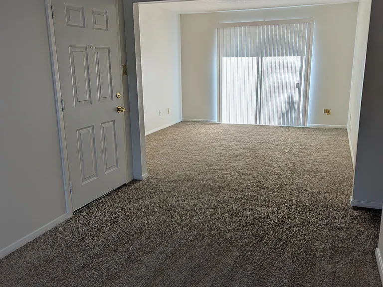 View into living room from dining area.