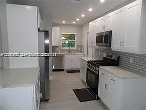 6540 W 11th Ave — Photo 3