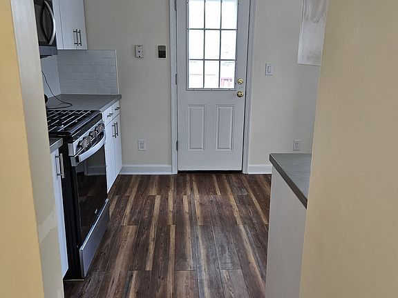 Kitchen with door to back deck.