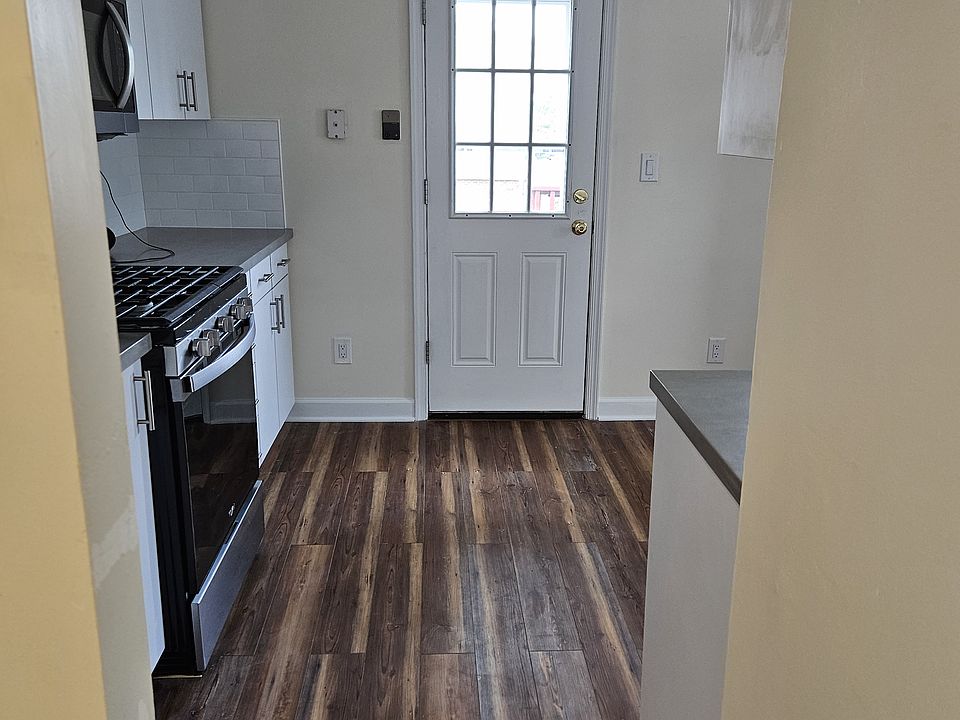 Kitchen with door to back deck.
