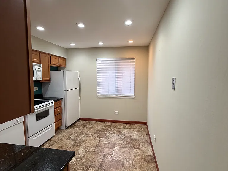 8469 Archer Ave #104 — Photo 4
