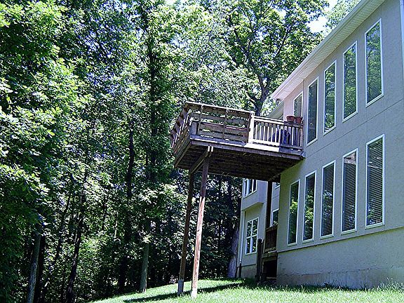 Natural setting off the rear deck overlooks the city of Parkville