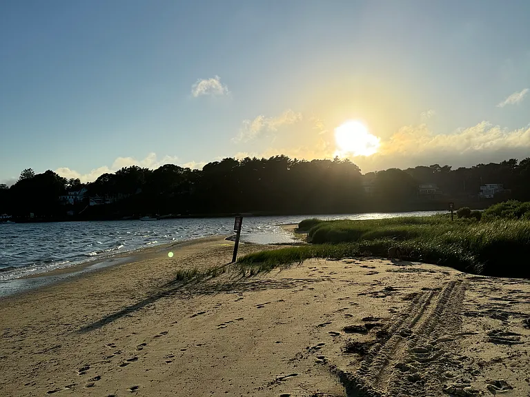 Private beach in association.