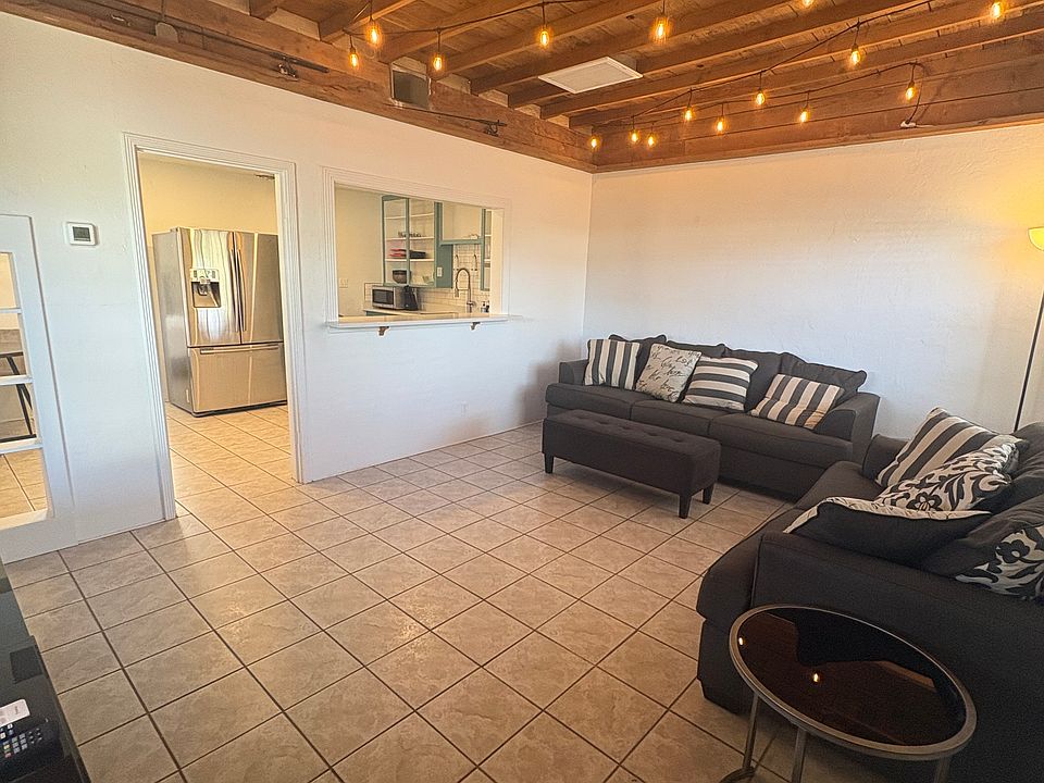 Entry from front door. 1bed/1bath unit with living room, kitchen and side patio