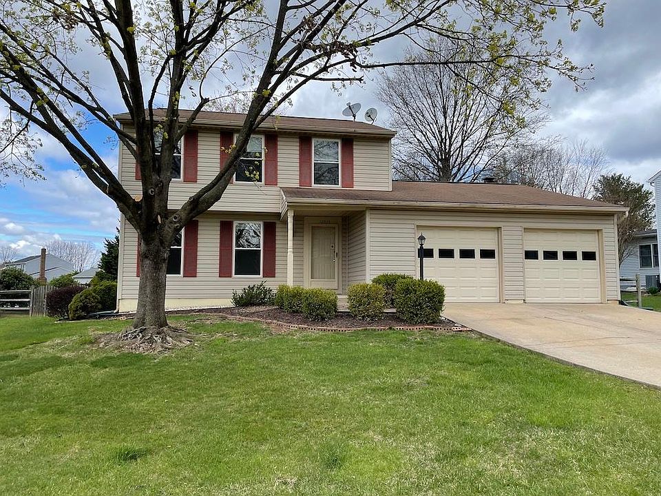 A family friendly neighborhood, 2 car garage with a lot of driveway and street parking.