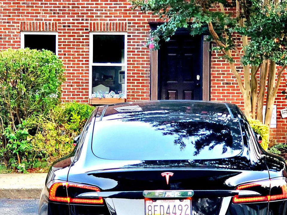 YOUR RESERVED PARKING IS DIRECTLY IN FRONT OF YOUR WATERFRONT HOME