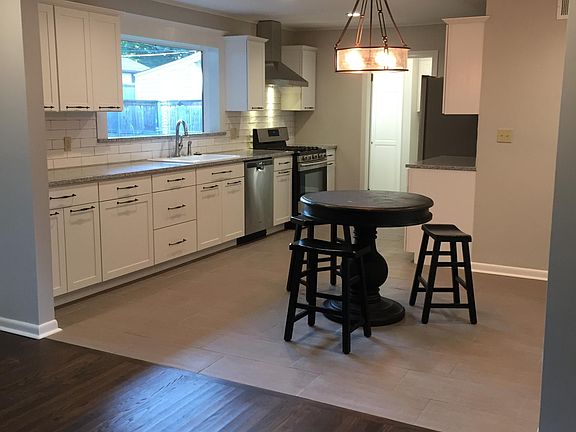 Open concept - showing kitchen and living room which opens into dining room.