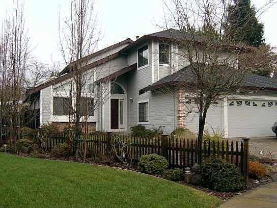 Front with 3 car garage