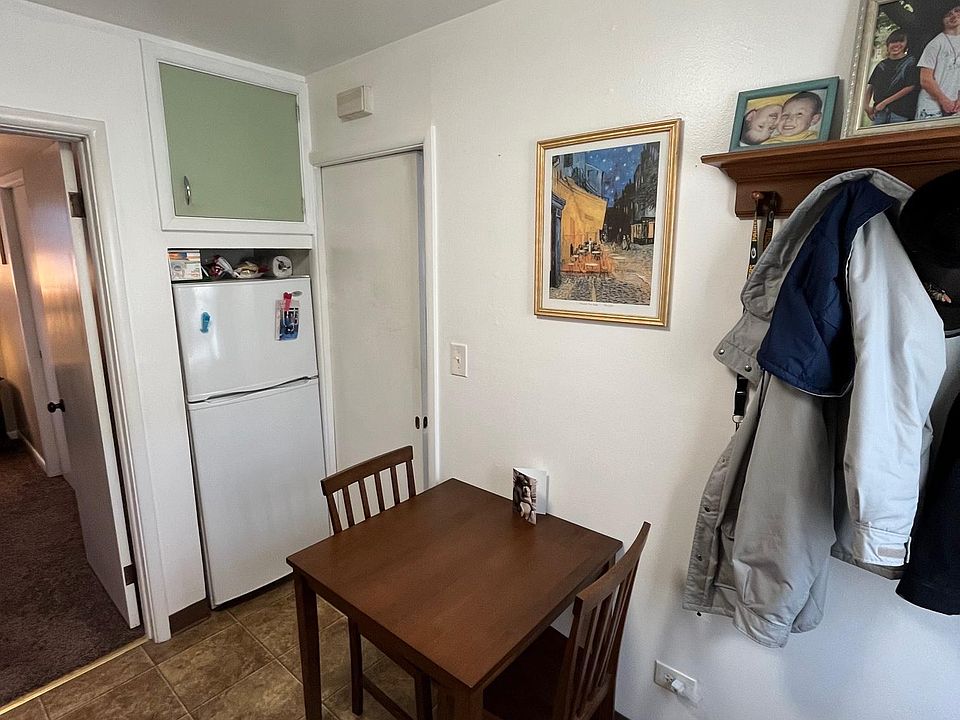 Kitchen with pocket door closed to the living room and dining room area.