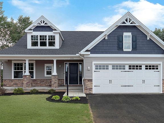 Exterior front view of the Aspen single level ranch plan, Craftsman style elevation C, by S A Homes