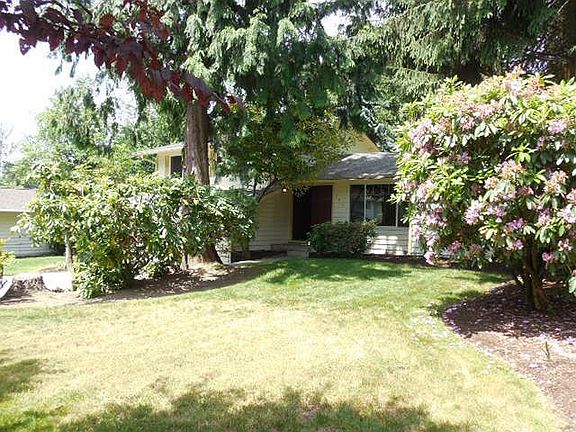 Front yard with mature landscaping