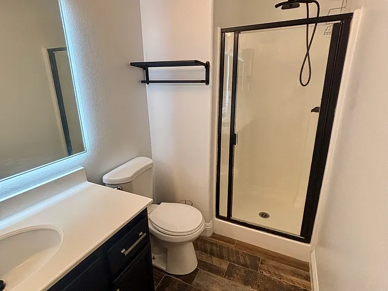 Bathroom. Mirror lights up.