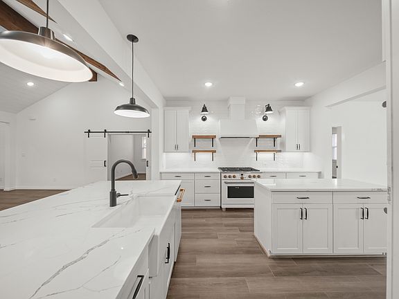 Kitchen with matte black hardware and white cabinets