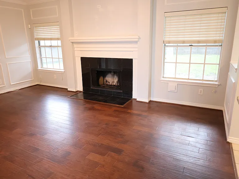 Family room. Fireplace. Plugin for your TV above the fireplace.