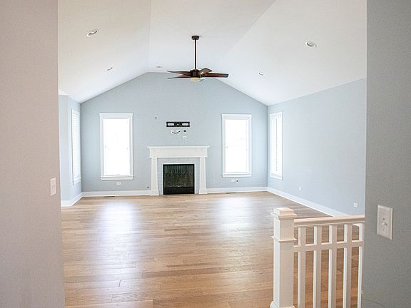 Large open living room with gas log fireplace