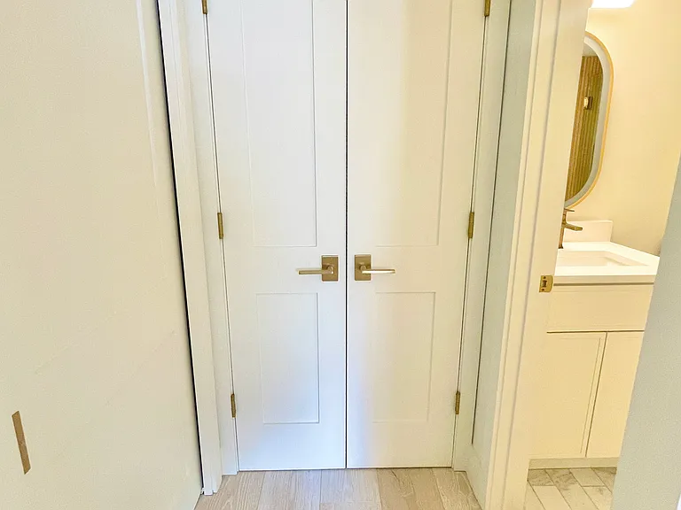 Locked pocket door to close off secondary bedroom for additional privacy