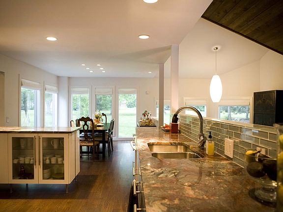 New kitchen w/stainless appliances and beautiful marble surfaces