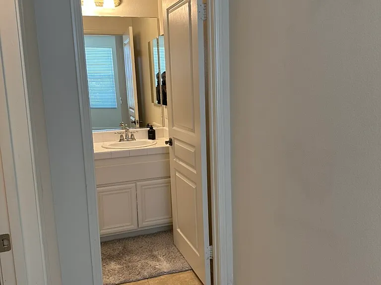 Full bathroom attached to downstairs bedroom