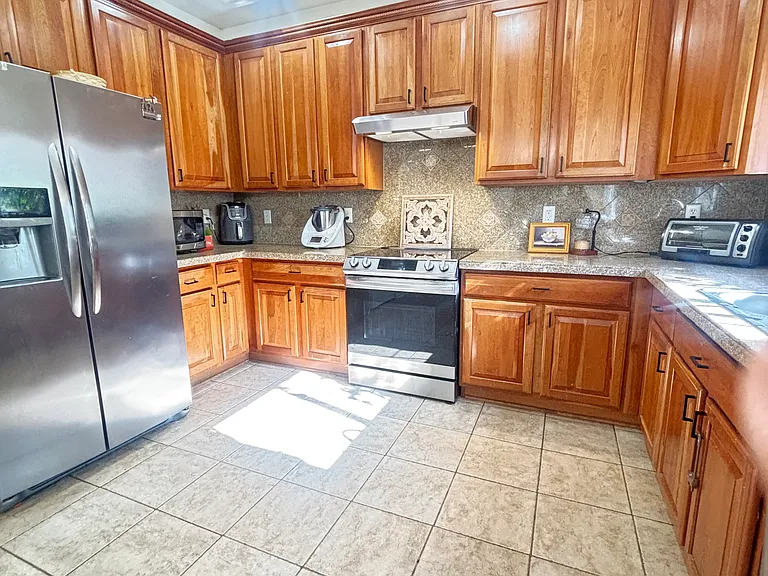 7425 S Norfolk St — Photo 6