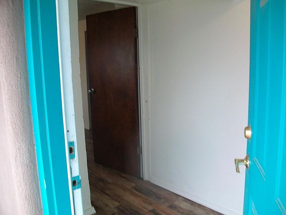 Steel door into mudroom/cold room entrance