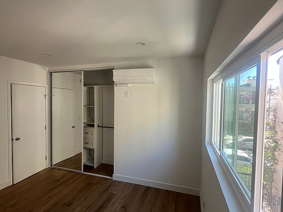 Bedroom with plenty of light and closet storage