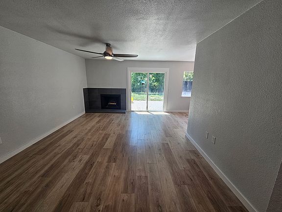 Living room with an entryway closet to the right.