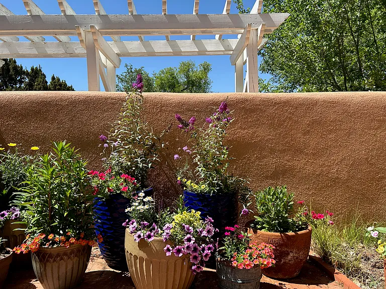 Additional View of Nambe Casita patio.
Patio is very private. Two parking spaces are opposite this view behind another wall.