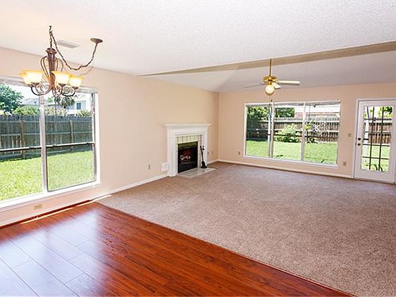 View of the Formal Dining Room and the Den in the background!
