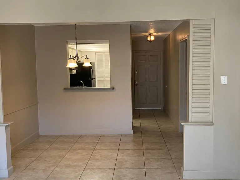 Dining area with ample space for a full-size table and easy access to both the kitchen and living room, creating a natural flow throughout the home.