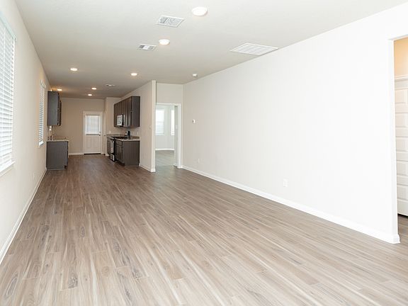 Family Room to Kitchen and Dining Area