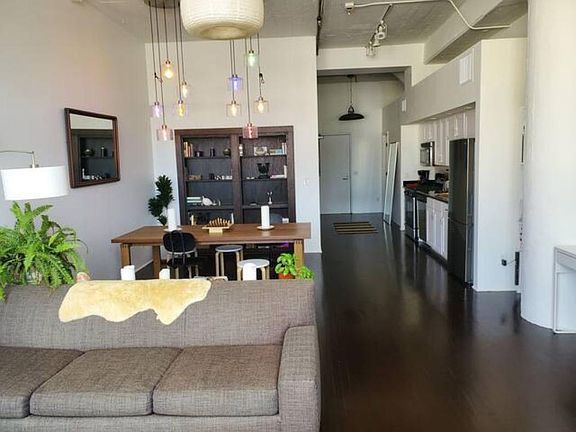 Living room / Library opening to the day time bedroom