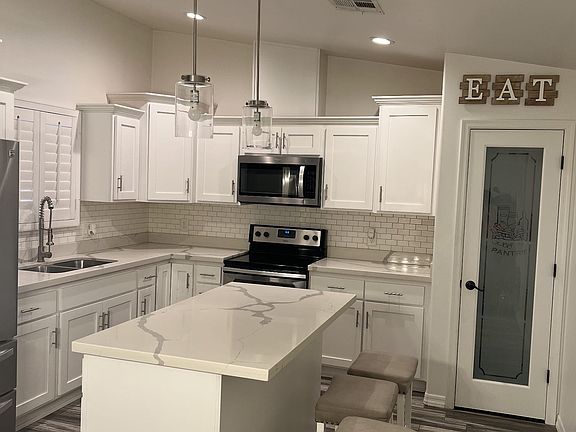 4th image of 10414 E 38th St