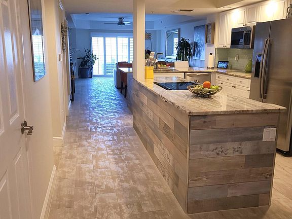 4th image of 4670 Links Village Dr Unit D406