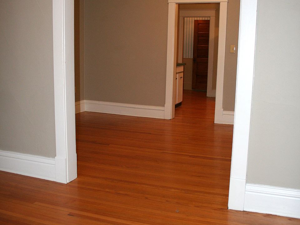 large living room and dining room with refinished hardwoood