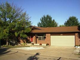 Brick Front with Vinyl Siding