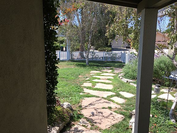 Front Entrance and Yard with Gorgeous Flagstone Path